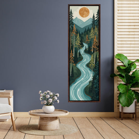 May include: A framed landscape art print depicts a winding river flowing through a forest. The artwork features a full moon, mountains, and tall trees in shades of green, blue, and orange. The print is displayed in a dark brown frame.