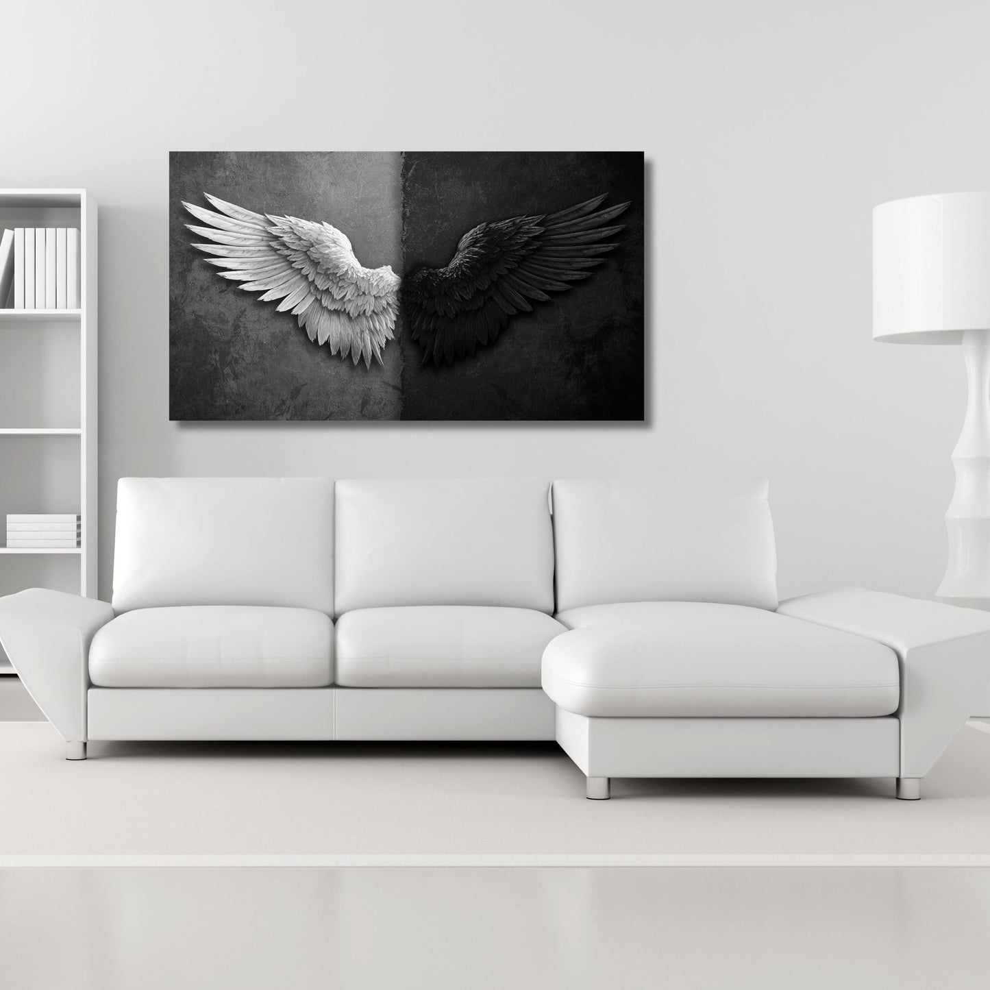 a large black and white winged artwork hanging on a white wall above a white sectional sofa in a minimalist living room setting.